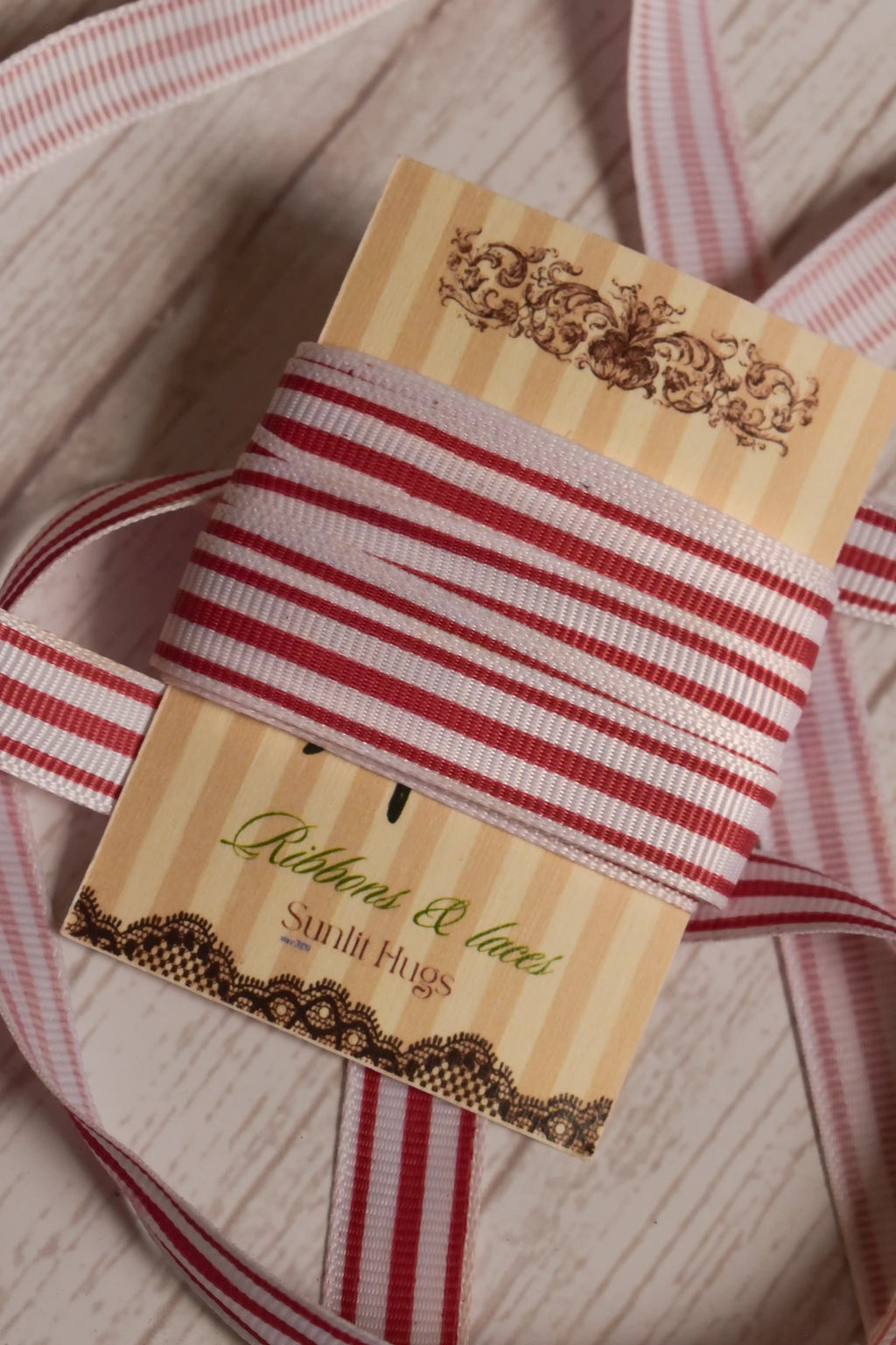 Cheese Tomato Stripes Ribbon displayed on a printed Sunlit Hugs ribbon card, showing its 13 mm width, red stripe detailing, and decorative finish.