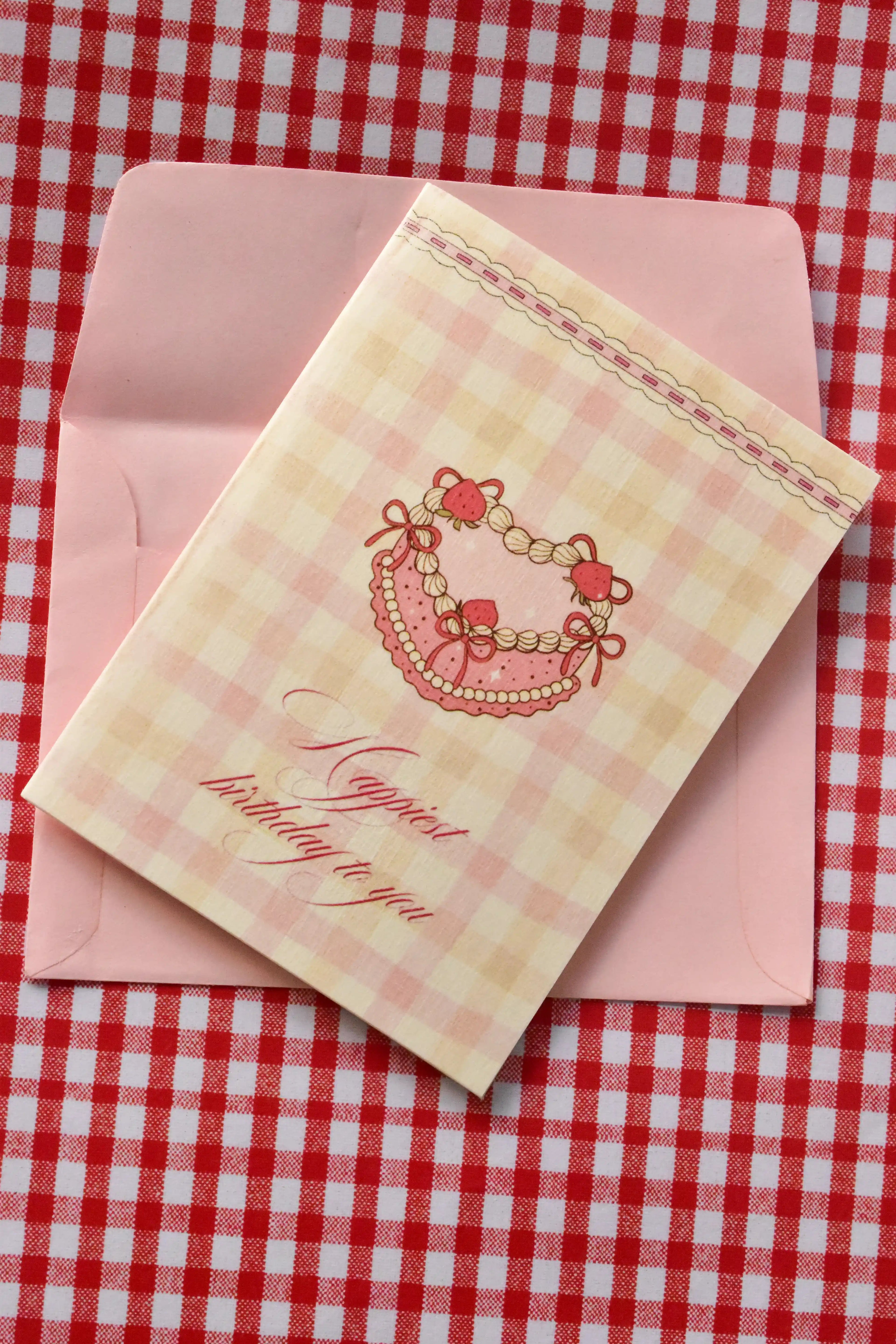 A slightly angled view that highlights the substantial feel of the 300 GSM textured sheet and the delicate pattern of the pink gingham background.
