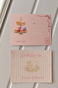 This view displays both the front and back design together, illustrating the full elegance of the Birthday Tea Postcard design set against a neutral background.