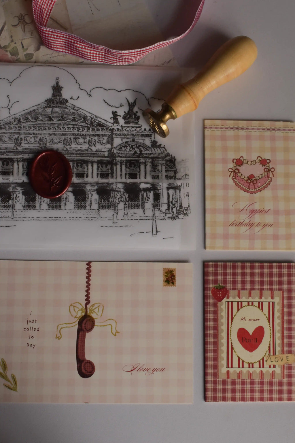 A romantic stationery gift bundle featuring a personalised Classic Scarlet Letter, heartfelt postcards and greeting cards, thoughtfully curated as a meaningful birthday keepsake.