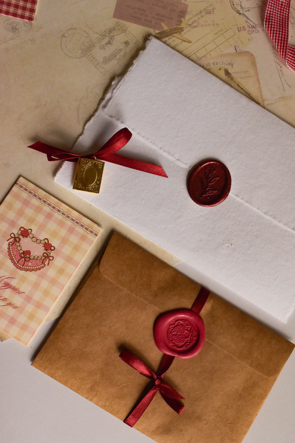 A sentimental birthday gift bundle with a personalised Golden Book Pendant, Classic Scarlet Letter, poetry postcards, and birthday card. 🌻