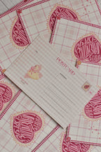 A pink gingham Happy Valentine's Day postcard features a retro heart and swan design.