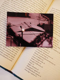 A Landour photo print shows snow resting on rooftops, capturing a quiet winter hillside scene.