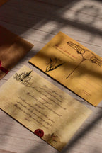 A classic love poem postcard is shown with aged paper tones and a moody vintage academic look.