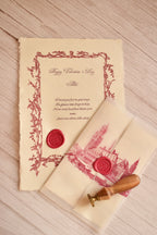 A handcrafted red heart wax seal decorates a vintage-style Valentine letter.