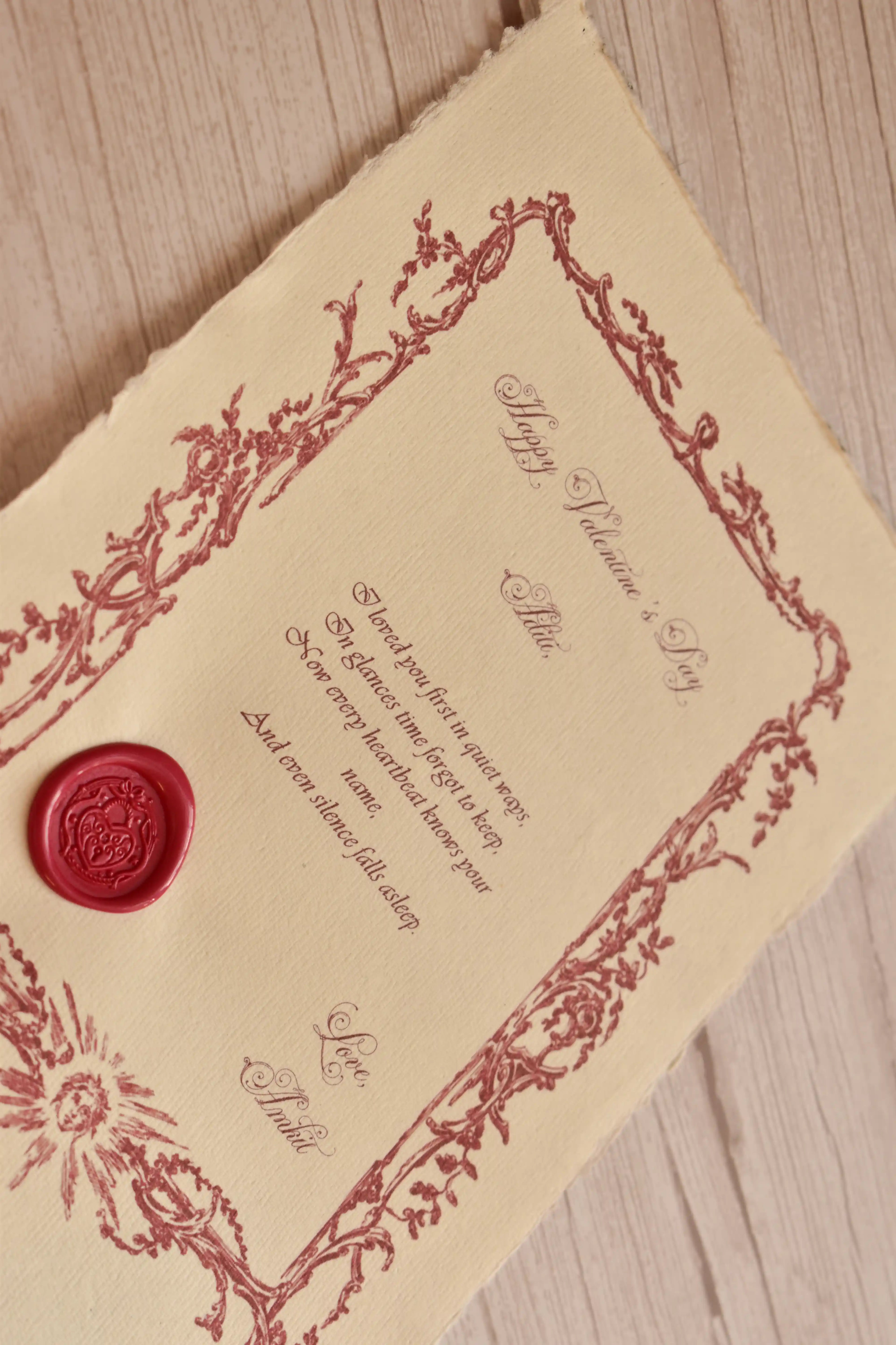 A personalized vintage love letter is arranged as a romantic paper keepsake with a handcrafted wax seal.