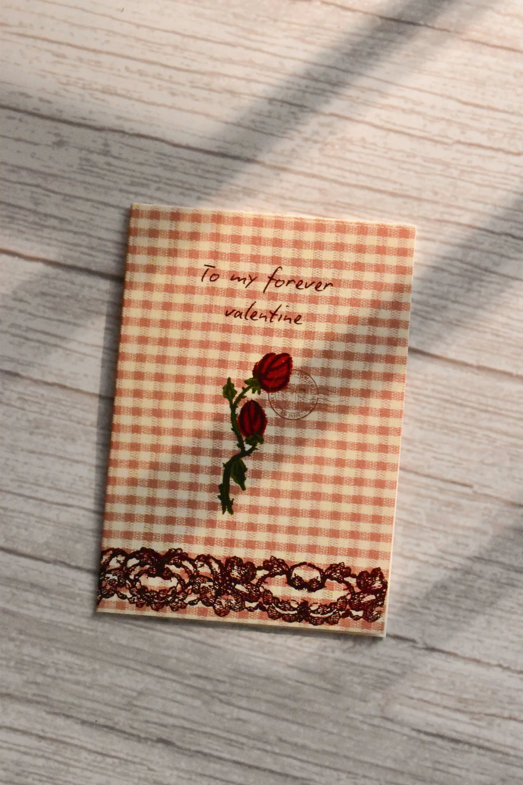 A mini Valentine card shows brown gingham with rose artwork and the phrase My Forever Valentine.