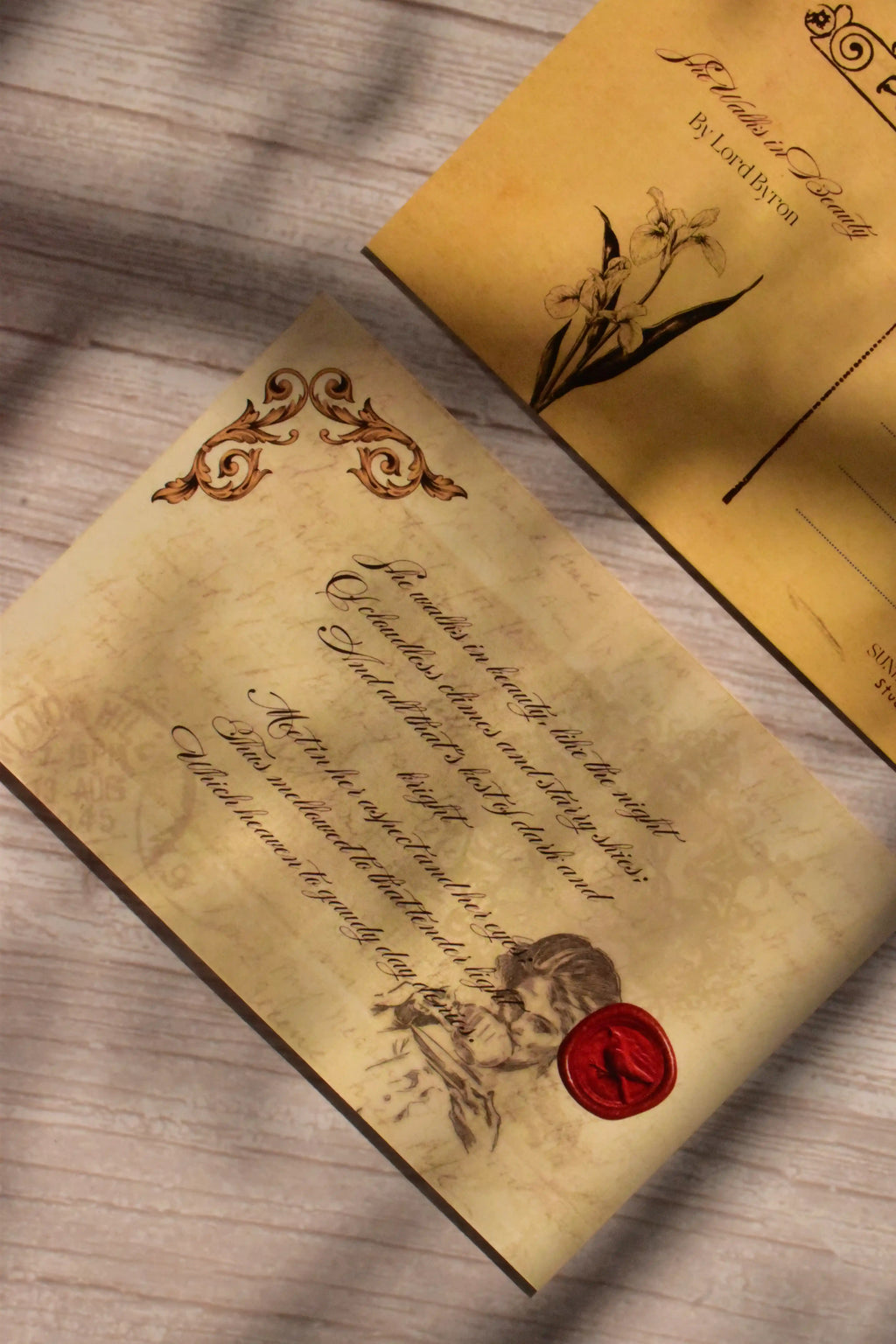 A love poem postcard is photographed with vintage paper texture and subdued dark academia styling.