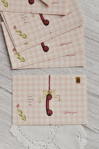 A vintage telephone Valentine postcard features the message Just called to say I love you.