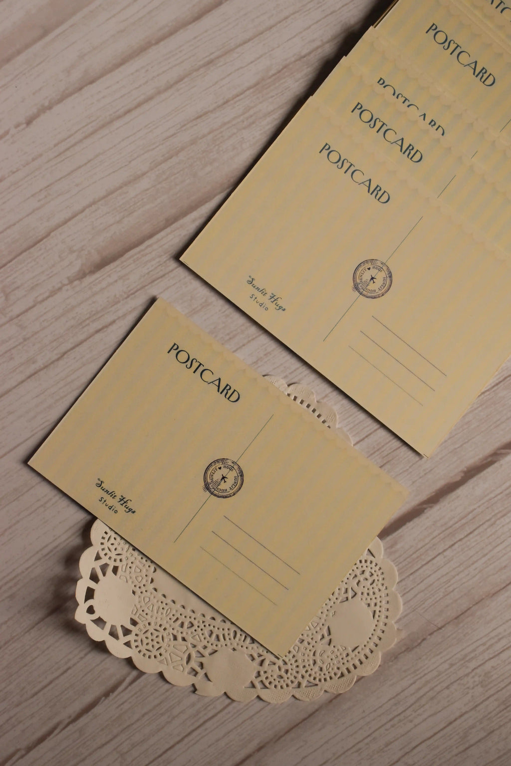 Vintage-inspired back design of the birthday postcard with a pale yellow background, postcard heading, circular postal mark and space for a personal message.